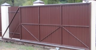 Купить откатные ворота из профнастила Амурск, цена от 1771 руб.